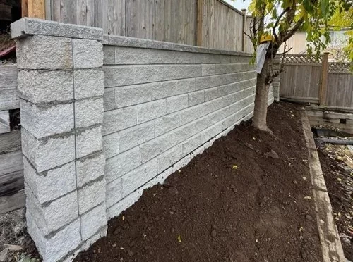 Mastering Retaining Wall Construction in Surrey for Strong Landscapes